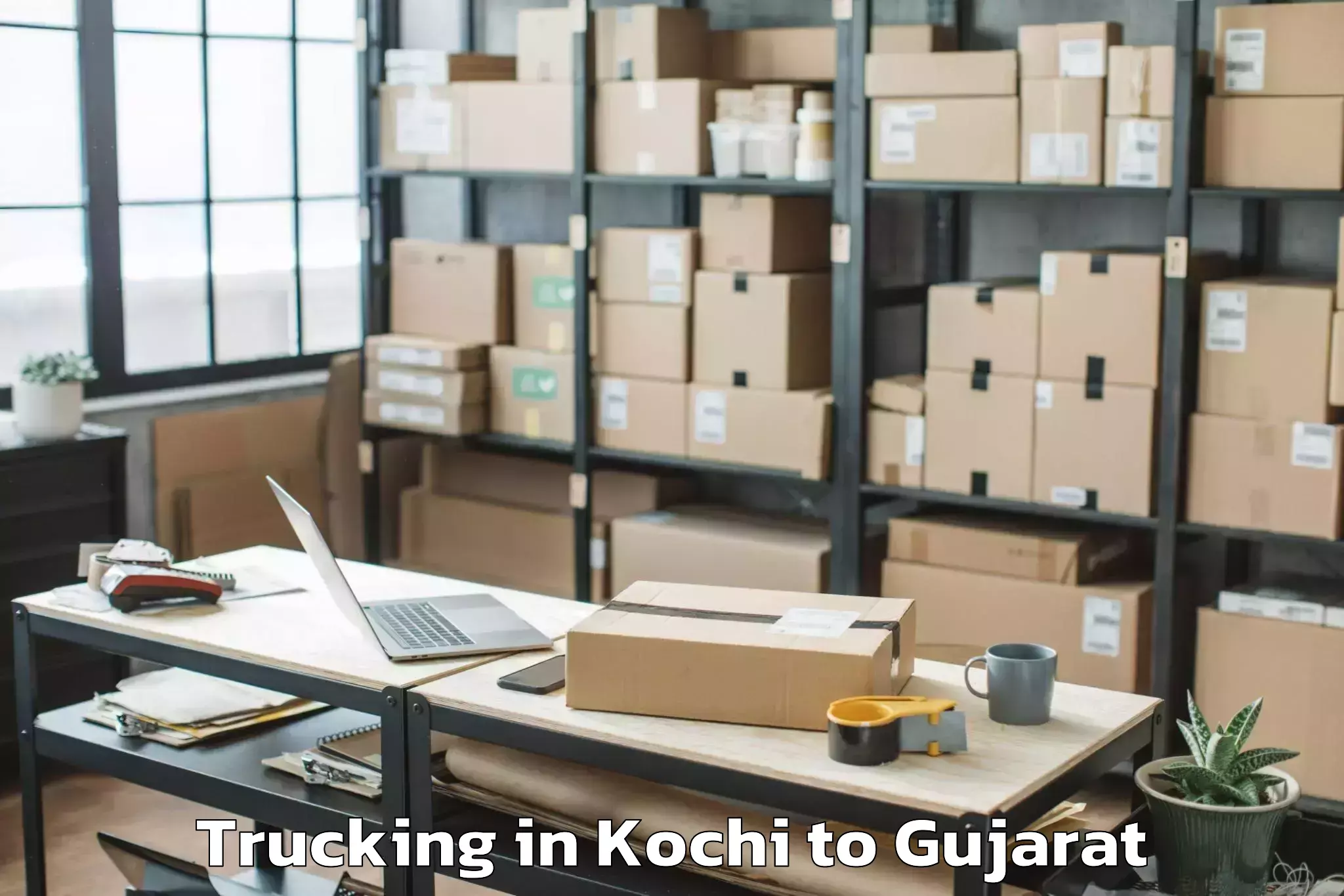 Professional Kochi to Umargam Trucking